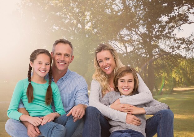 Retrato de una familia feliz en el parque