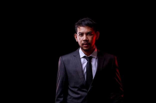 Foto retrato, de, joven, asiático, hombre de negocios, en, negro