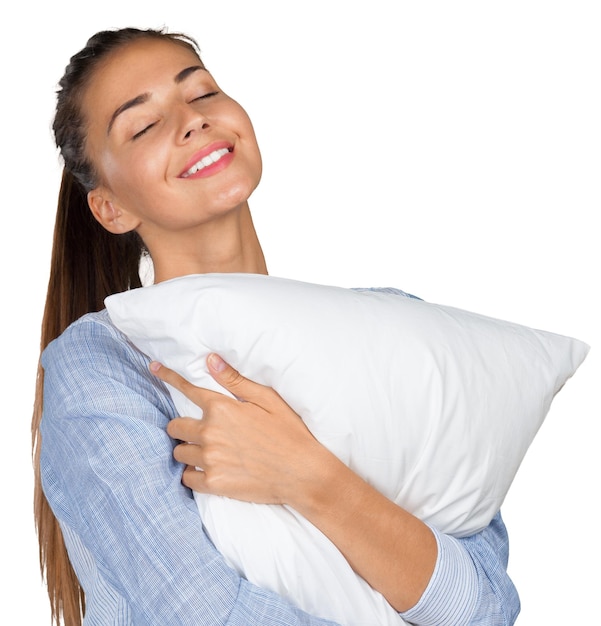 Retrato de joven bella mujer con almohada