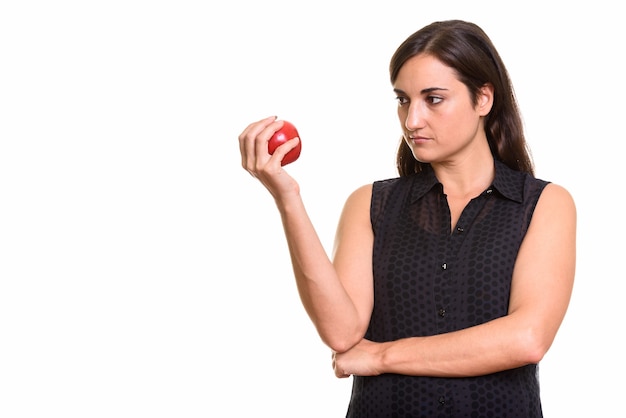 Retrato de joven bella mujer con manzana roja