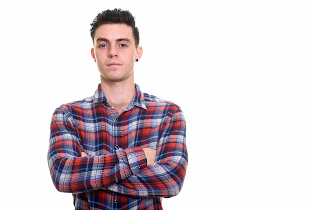 Foto retrato de un joven de pie contra un fondo blanco