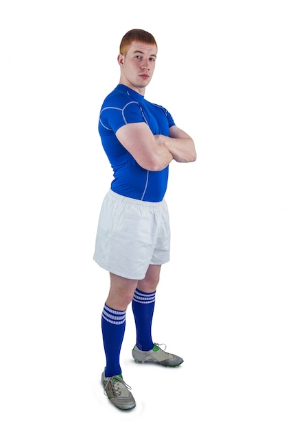 Retrato de un jugador de rugby con los brazos cruzados