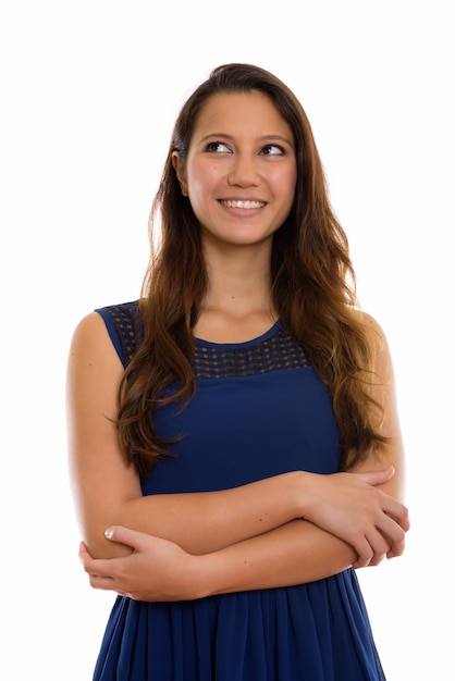 Foto retrato de mujer hermosa joven feliz pensando con los brazos cruzados