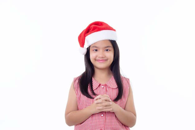 Retrato de niña asiática con gorro de Papá Noel