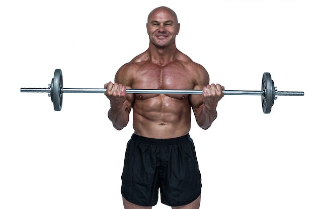 Retrato, de, sonriente, muscular, hombre, elevación, crossfit