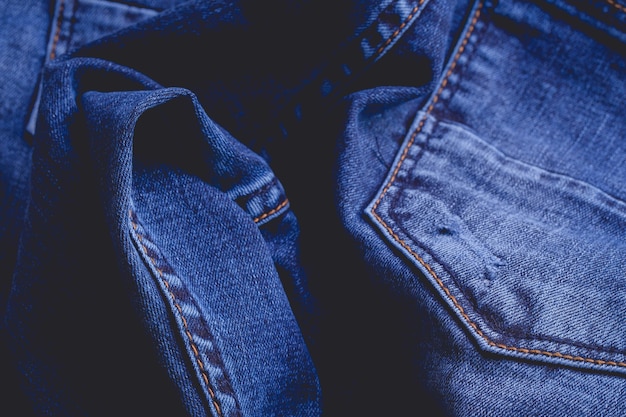 Retro-Farbton der blauen Denim-Jeans-Stoffbeschaffenheit für Modedesign der Hintergrundwebsite oder Hintergrundprodukt