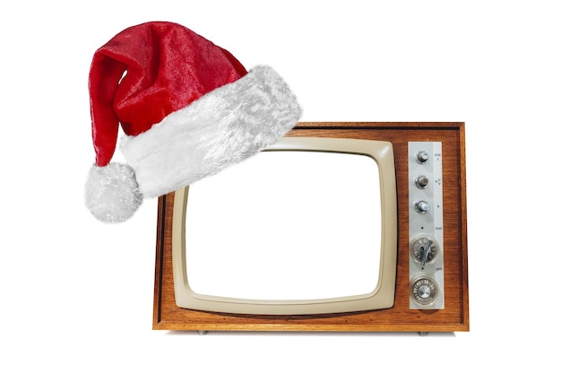 Retro-Fernseher mit Weihnachtsmannmütze für Weihnachten auf weißem Hintergrund