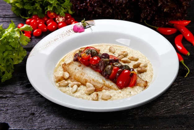 Risotto con filetes de pescado y castañas