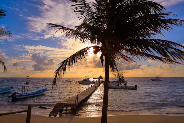 Riviera Maya sunrise pier Caribe México