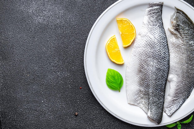 robalo filé de peixe frutos do mar refeição saudável comida lanche dieta na mesa cópia espaço fundo de comida