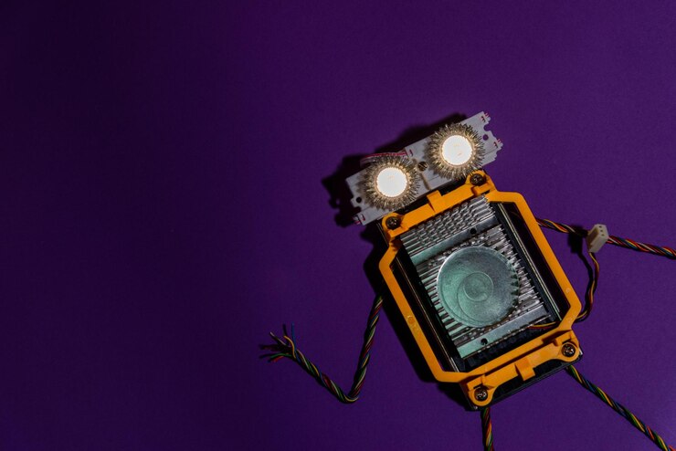 Foto el robot hecho a mano se colocó plano en la plataforma arduino diy ai steamfondo oscuro púrpuraeducación básica para niños y adolescentes robótica y electrónicacopiar espacio