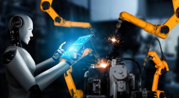 Robot industrial mecanizado y brazos robóticos para montaje en producción en fábrica.