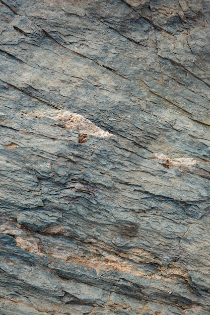 Roca de roca gris de textura natural con grietas