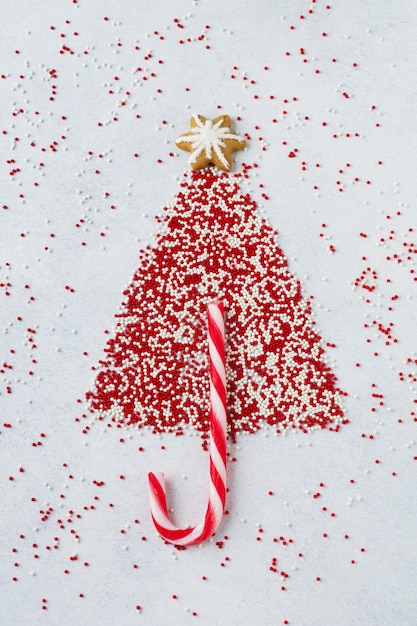 Rocía y piruleta en forma de árbol de Navidad