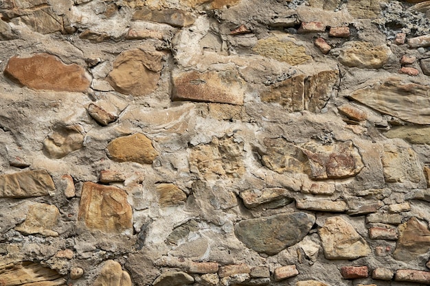 Rock-Stein-Textur. Eine Mauer aus Bergsteinen