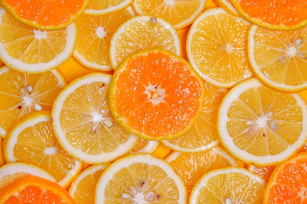 Rodaja de naranja y limones Lindo fondo de pantalla para una bebida saludable de verano