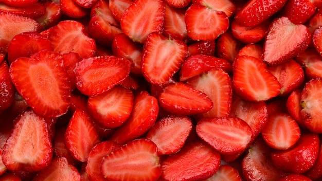 Rodajas de fresa. Macro de bayas frescas. Superficie de la fruta