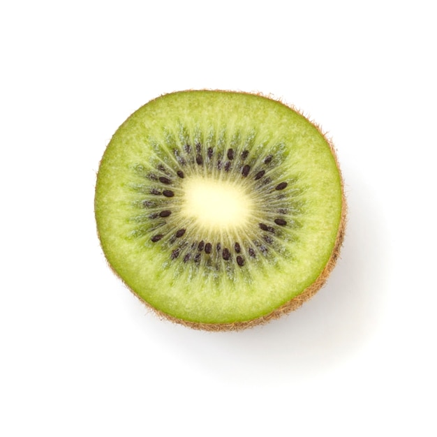 rodajas de kiwi en una pared blanca