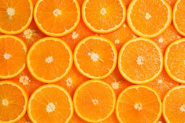 Foto rodajas de naranjas como vista superior de fondo