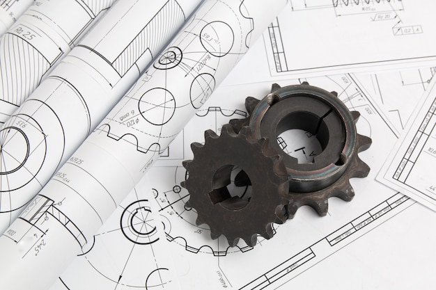 Rodas dentadas e desenhos de engenharia de peças e mecanismos industriais