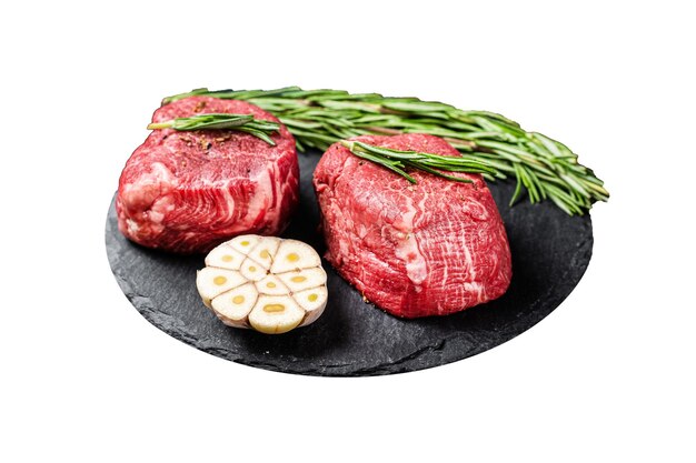 Rohes Fillet Mignon Rindfleischsteak mit Kräutern und Knoblauch Marmorfleisch Isoliert auf weißem Hintergrund Top-View