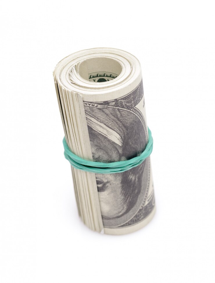 Foto rollo de dinero