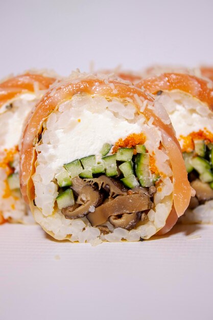 Lion King Roll - Spicy crab and avocado rolled in premium sushi rice, topped with seared spicy salmon at Osaka Japanese Restaurant in Gaffney, SC
