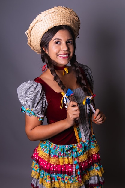 Foto ropa de mujer brasileña de festa junina arraial festa de sao joao retrato vertical