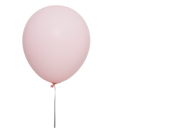 Rosa Ballon, der auf Weiß schwimmt