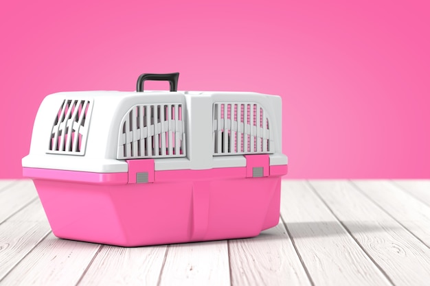 Rosa Pet Travel Plastic Cage Carrier Box auf einem Holztisch und rosa Hintergrund. 3D-Rendering