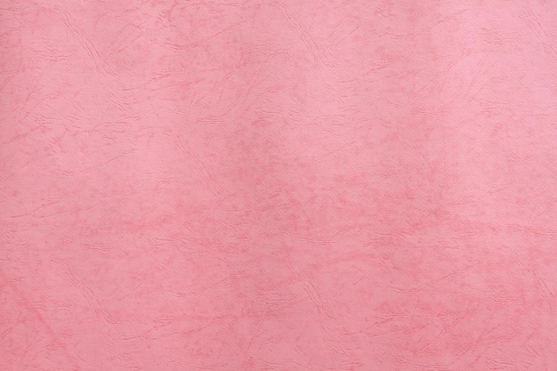 Rosa Recyclingpapier Hintergrund. Basteln Sie Öko-strukturierten Papierblatthintergrund für Karten und andere Designideen. rosa Koralle farbige Oberfläche schärfen