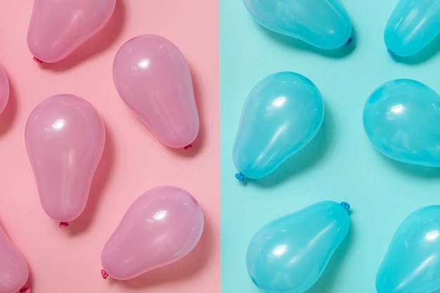 Foto rosa und blaue luftballons hintergrund. geschlecht offenbaren partei, junge oder mädchen. konzept der gleichstellung der geschlechter.