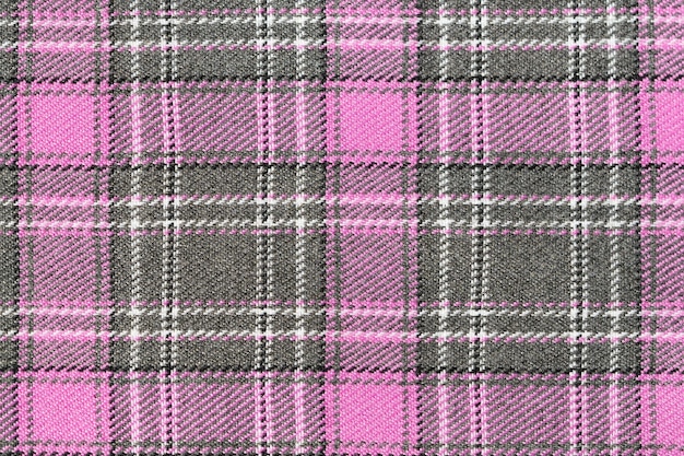 Foto rosa und graue tartan-textur hintergrund für ihr design traditionelle schottische kleidung und stil