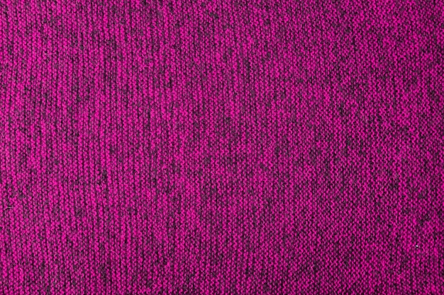 Rosa und schwarze Melange-Strickstruktur und flacher Hintergrund