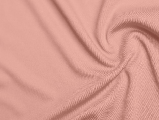 Roségoldfarbener Samtstoff als Hintergrund verwendet Leerer rosafarbener Stoffhintergrund aus weichem und glattem Textilmaterial Es gibt Platz für Text