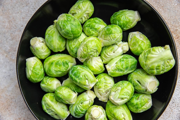 Rosenkohl grün rohes Gemüse gesunde Mahlzeit Snack Diät auf dem Tisch Kopie Raum Essen