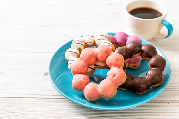 Rosquinha com café preto