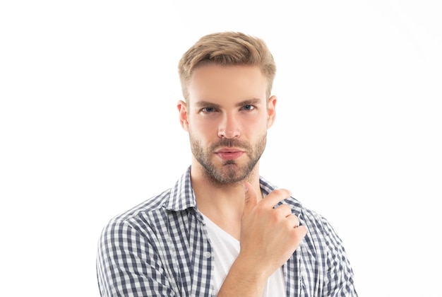 Rosto de homem com a barba por fazer em camisa quadriculada homem com a barba por fazer Foto de estúdio de cuidados com a pele do homem com a barba por fazer