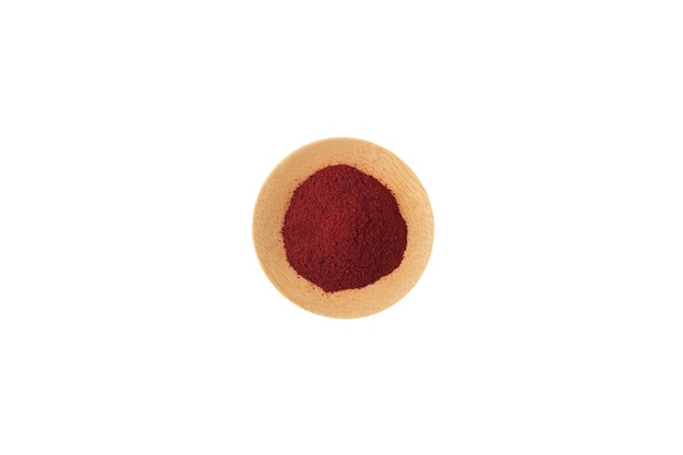 Rote-Bete-Pulver in Holzplatte. Lebensmittelzusatzstoff E162, natürlicher Farbstoff Rübenrot Rote-Bete-Trockenpulver.