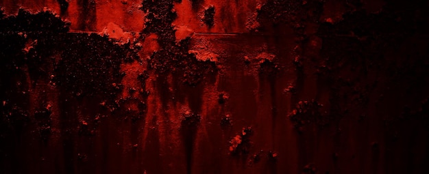 Rote Grunge-Wandbeschaffenheit. Dunkelroter Grunge-Hintergrund. Horror Zement Textur