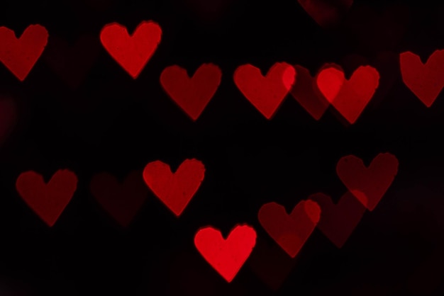 Rote Herzen Bokeh als Hintergrund Valentinstag-Konzept Der 14. Februar