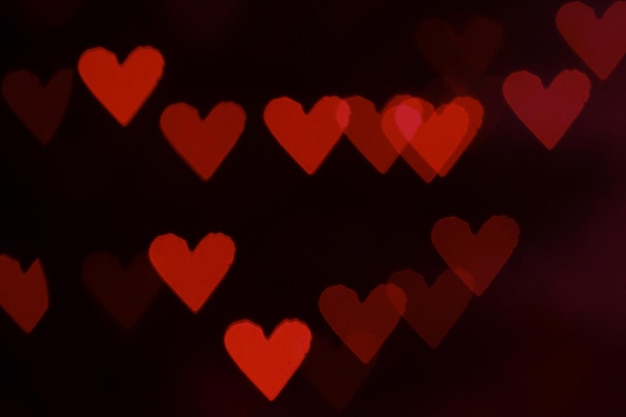 Rote Herzen Bokeh als Hintergrund Valentinstag-Konzept Der 14. Februar