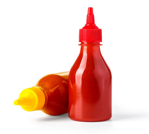 Rote Plastikflasche mit Ketchup und gelbem Senf