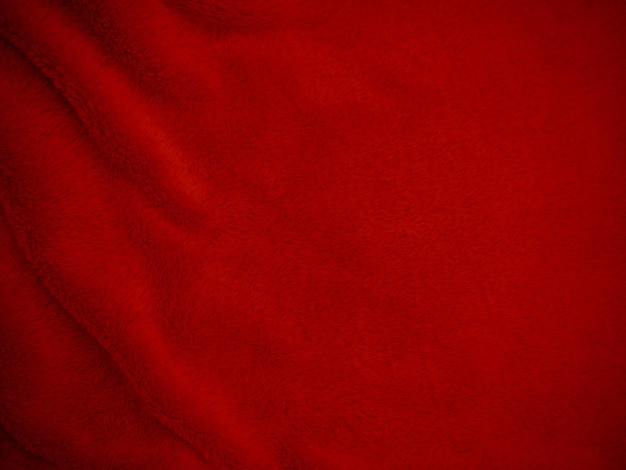 Rote, saubere Wolltextur, Hintergrund, helle natürliche Schafwolle, scharlachrot, nahtlose Baumwolltextur aus flauschigem Fell für Designer, Nahaufnahme, Fragment, Teppich aus rotem Wollstoff