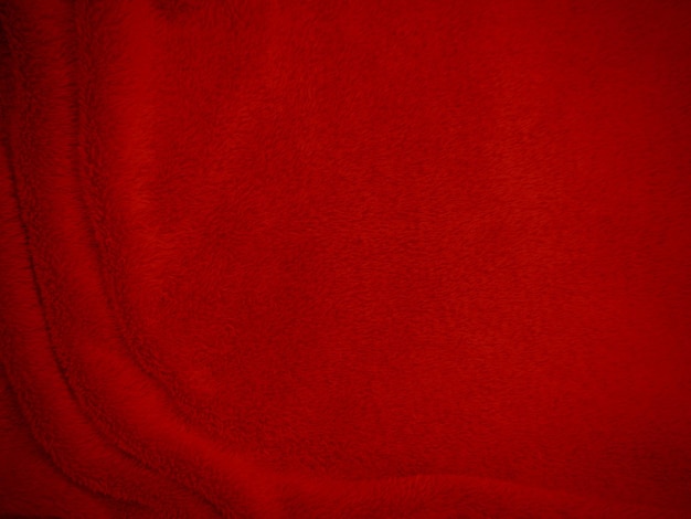 Rote, saubere Wolltextur, Hintergrund, helle natürliche Schafwolle, scharlachrot, nahtlose Baumwolltextur aus flauschigem Fell für Designer, Nahaufnahme, Fragment, Teppich aus rotem Wollstoff
