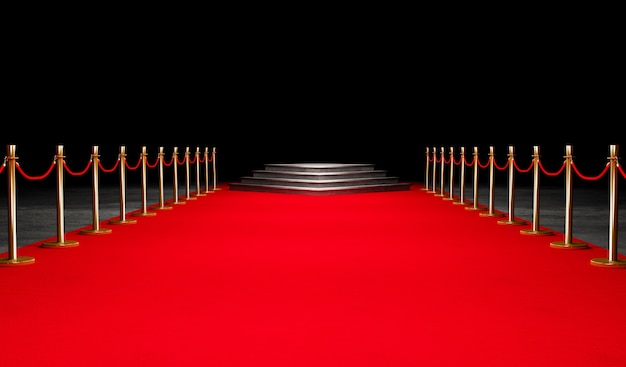 Foto roter ereignis-teppich, treppe und goldseil-sperren-konzept des erfolgs und des triumphes