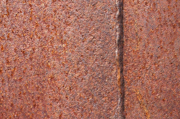 roter gerosteter Metallhintergrund mit Nahaufnahme