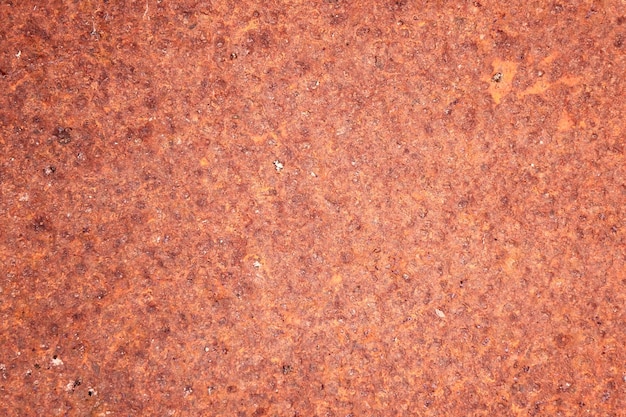 Foto roter grunge-stein, strukturierter wandhintergrund, abstrakte rustikale braune oberfläche
