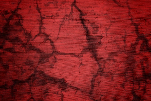 Roter Hintergrund mit dunkelrotem Hintergrund und dem Wort „Grunge“ darauf.