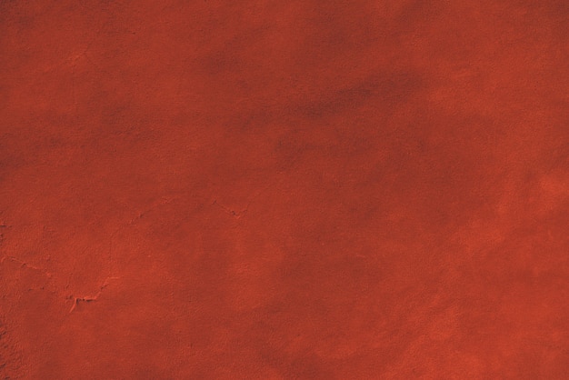 Roter matter Hintergrund des Wildlederstoffes. Samtstruktur aus nahtlosem Leder. Filzmaterial.